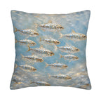 A square decorative throw pillow cover isolated on a pure white background, featuring an impressionistic oil painting of a school of silver and gold shimmering fish swimming in a textured blue sea.