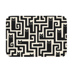 Black cat maze floor mat with rounded corners on white background.