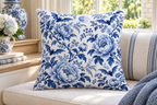 Blue & White Bat Floral Printed Pillow Cover, lifestyle view 4: Close editorial view on an indoor window bench, full pillow and all edges visible, gentle side light reveals the real textile texture.