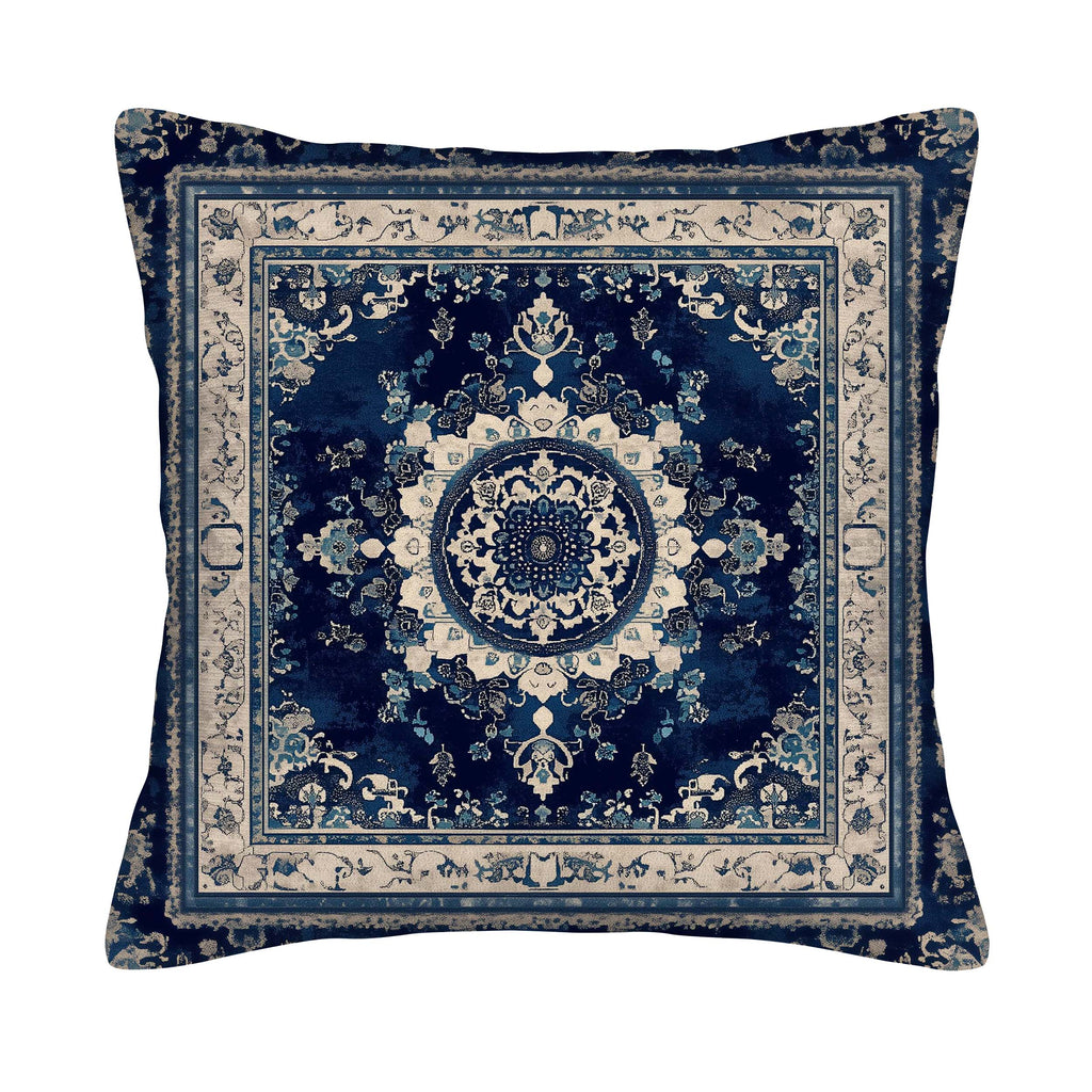 Blue medallion pillow cover with distressed vintage ornamental pattern.