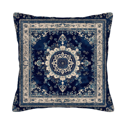Blue medallion pillow cover with distressed vintage ornamental pattern.