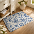 Blue toile floral floor mat styled in a warm entryway.