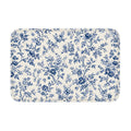 Blue toile floral floor mat with rounded corners on white background.