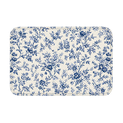 Blue toile floral floor mat with rounded corners on white background.