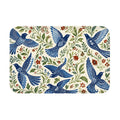 A rectangular doormat featuring a vintage bluebird and floral pattern with intricate green leaf vines.