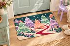 Candy Forest Christmas Printed Floor Mat, lifestyle view 1: One mat laid flat INSIDE the front door, full landscape mat and all four rounded corners visible at small accent-mat scale, angled downward photography.