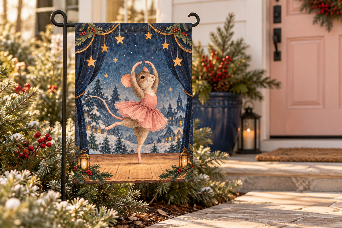 Christmas Ballet Mouse Printed Garden Flag, lifestyle view 2: One flag on a separate black garden stake along a short garden path, lower garden view with planting behind; no people, full rectangle visible.