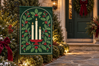 Christmas Candles & Holly Printed Garden Flag, lifestyle view 2: One flag on a separate black garden stake along a short garden path, lower garden view with planting behind; no people, full rectangle visible.