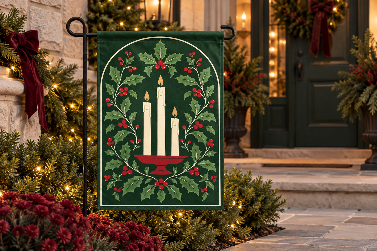 Christmas Candles & Holly Printed Garden Flag, lifestyle view 4: One flag on its separate black garden stake in a mailbox garden with restrained October seasonal planting, wide but product-led welcoming suburban scene.