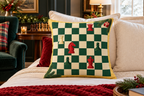 Christmas Chessboard Printed Pillow Cover, lifestyle view 3: Centered in front of plain pillows on a neatly made guest bed; eye-level composition, believable 18-inch pillow scale.