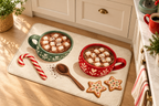 Christmas Hot Cocoa Printed Floor Mat, lifestyle view 4: Close overhead-oblique view of one mat on a clean pale-wood floor near a cabinet, all four corners in frame, soft side light reveals short flannel nap.