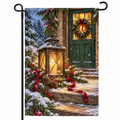 Christmas lantern garden flag on a black display stand against a white background.