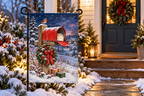 Christmas Mailbox Printed Garden Flag, lifestyle view 2: One flag on a separate black garden stake along a short garden path, lower garden view with planting behind; no people, full rectangle visible.