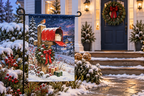 Christmas Mailbox Printed Garden Flag, lifestyle view 4: One flag on its separate black garden stake in a mailbox garden with restrained October seasonal planting, wide but product-led welcoming suburban scene.
