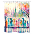 Vibrant watercolor shower curtain featuring a row of whimsical, colorful cats with an artistic city skyline background.