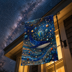Cosmic whale garden flag displayed on a house-mounted pole, with warm window light and a dramatic Milky Way sky.