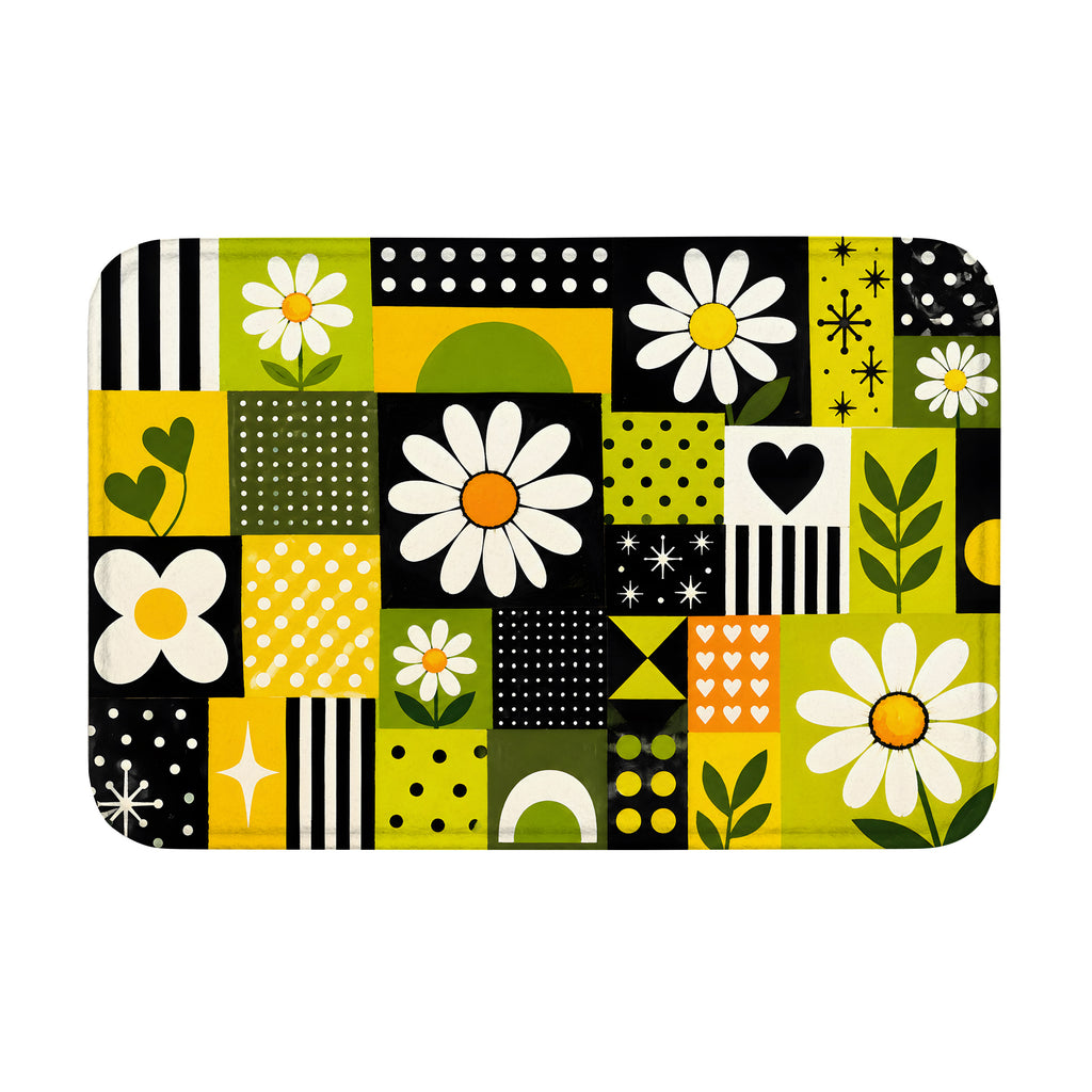 A top-down product view of a rectangular geometric doormat featuring white daisy patterns and green-yellow accents.