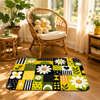 A stylized daisy floral doormat placed on a wooden floor in a cozy living room next to a rattan chair.