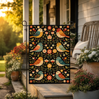 Folk songbird floral garden flag styled on a sunny front porch.