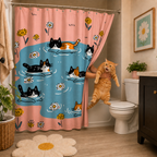 A hand reaching from behind the pink cat-themed shower curtain to lift a funny, wide-mouthed orange cat, set in a cozy modern apartment bathroom.