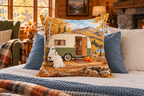 Ghost Camper Halloween Printed Pillow Cover, lifestyle view 3: Centered in front of plain pillows on a neatly made guest bed; eye-level composition, believable 18-inch pillow scale.