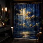 A navy blue and gold moonlight sea shower curtain installed in a dark luxury bathroom with black marble walls, brass faucets, dark wooden vanity, and warm glowing candles.