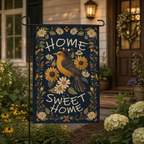 Home Sweet Home garden flag close-up in a warm front yard setting