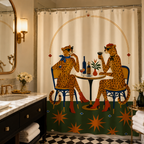 Whimsical leopard cafe shower curtain design paired with a black bathroom vanity and marble countertop.