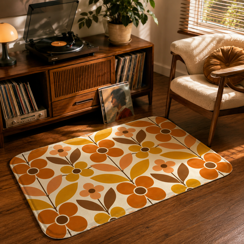 A mid-century modern orange floral accent rug styled on a hardwood floor next to a vintage wooden vinyl record player console and a cozy armchair.