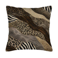 Square patchwork animal print pillow cover with leopard, zebra, and snake textures isolated on white.