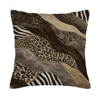 Square patchwork animal print pillow cover with leopard, zebra, and snake textures isolated on white.