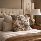 An abstract leopard and botanical print accent pillow showcased on a cozy bed with a classic beige tufted headboard, soft neutral linens, and a warm wooden bedside table.
