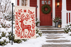 Nordic Reindeer Christmas Printed Garden Flag garden flag, lifestyle view 1: A small red-painted American bungalow porch after a clean fresh snowfall, pared-back Nordic holiday styling, one simple green wreath without bow on the red door.