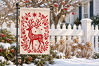 Nordic Reindeer Christmas Printed Garden Flag garden flag, lifestyle view 3: A quiet white picket fence beside a winter garden, bare apple-tree branches softly blurred behind, a few red apples lingering.