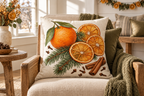 Orange & Clove Christmas Printed Pillow Cover, lifestyle view 1: Placed upright on an accent chair, nearly frontal with full print clearly visible; room-wide interior composition.