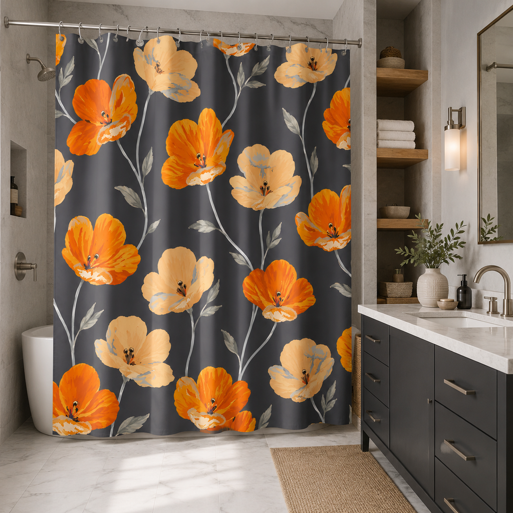 An orange and cream floral print shower curtain on dark grey background, styled in a sleek bathroom with charcoal grey cabinetry, marble floor, and warm sconce light.