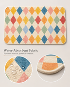 Pastel harlequin bath mat with water-absorbent surface and rounded edges.