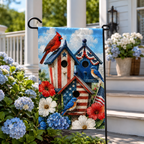 Patriotic birdhouse garden flag displayed on a black metal stand next to blue hydrangeas on a porch.
