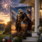 Freedom eagle warrior garden flag displayed on the lawn with brilliant celebratory fireworks lighting up the evening sky.