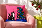 Christmas Cat & Tree Printed Pillow Cover pillow covers, lifestyle view 2: The exact cat pillow on a simple blush-pink upholstered accent chair beside a lime-green small side table and a white wall.