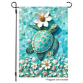Sea turtle mosaic garden flag with shells, white flowers, and turquoise background