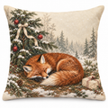 Sleeping fox Christmas pillow cover with an ivory woodland print, shown on a white background.