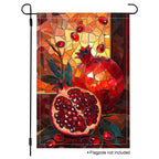 Stained glass pomegranate garden flag with rich red fruit and warm Mediterranean-inspired colors.