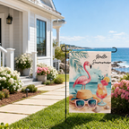 Summer flamingo beach garden flag displayed outside a coastal home