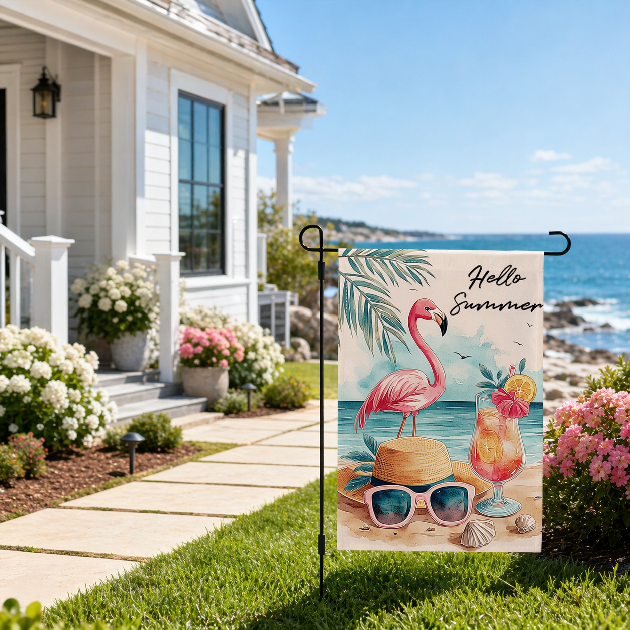 Summer flamingo beach garden flag displayed outside a coastal home