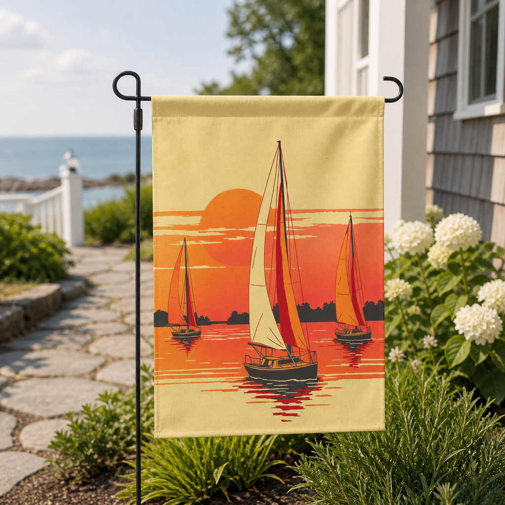 Sunset sailboat garden flag displayed near a coastal home garden.