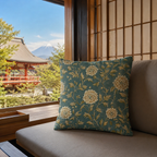 Teal chrysanthemum pillow cover on a tatami seat near a shoji window.