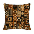A square decorative throw pillow cover isolated on a pure white background, featuring a vintage African tribal print with geometric patterns, swirls, sun motifs, and eyes in rich earthy brown and beige tones.