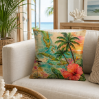 A tropical throw pillow featuring a vintage watercolor Florida and Caribbean map print with palm trees and a red hibiscus flower, placed on a modern beige sofa.