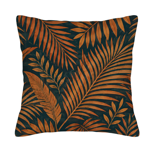 Square tropical palm leaf pattern pillow cover with a dark background isolated on white.